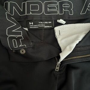 Under armour youth baseball pants.
